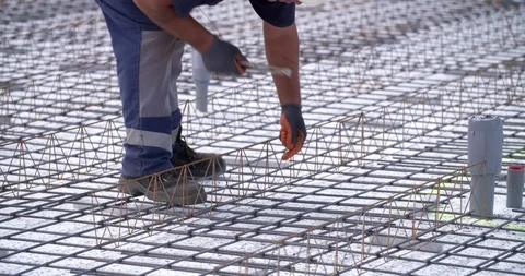 Worker braiding concrete at a building site Netherlands, 4K Stock Footage 111635804