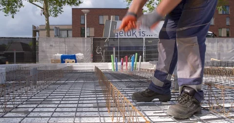 Worker braiding concrete at a building site Netherlands, 4K Stock Footage 111635868