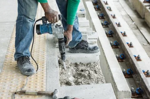 Worker breaking concrete Stock Photos