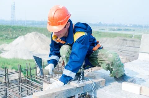 Worker on bridge construction Stock Photos