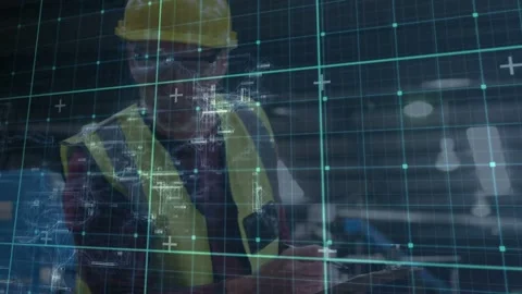 Worker bringing tablet closer, tapping and entering inventory data as HUD grid Stock Footage 333901495