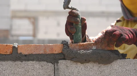 Worker build brick wall Video stock 52815797