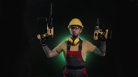 Worker, builder, engineer measures using a measuring tape. Focus shift on Stock Footage 99212164