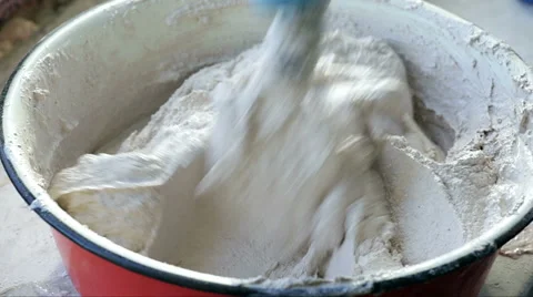 Worker builder mix cement in bucket.  Stock-Footage 60413905