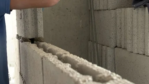 The worker is building a wall 2 Stock Footage 318952291