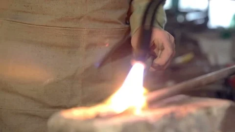 Worker burner heats details. Close-up Stock Footage 77006074