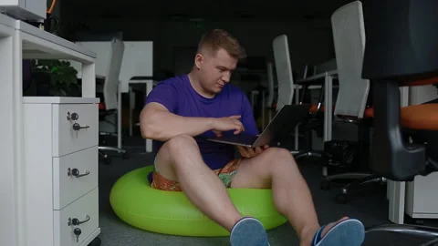 Worker can't wait for vacation working at office. Stock Footage 109614786