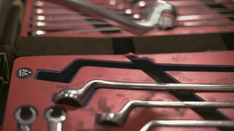 Worker car center after change adds keys to place indoors Stock Footage 71509040