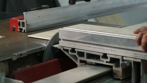 Worker carefully operates a table saw Video stock 327015012