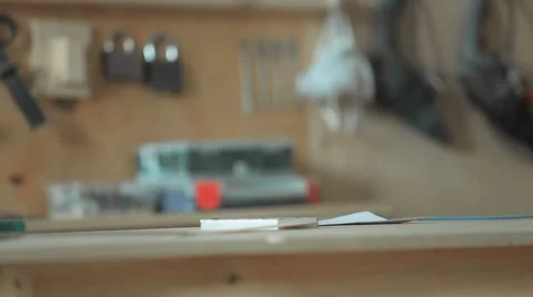 Worker carpenter writes the data on paper Stock Footage 61821888