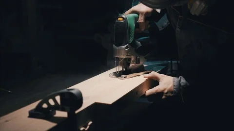 Worker carpentry workshop, using the jigsaw , cut the block, assembly of garden  스톡 동영상 78438284