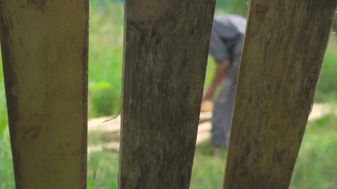 A worker carries a Board 스톡 동영상 92720085