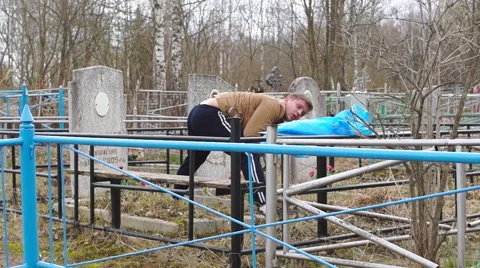 The worker on a cemetery Stock-Footage 62550352