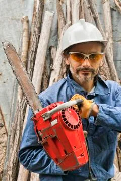 Worker with a chainsaw Stock Photos