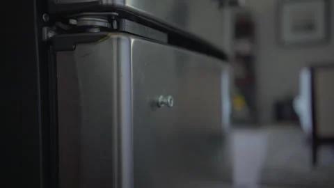 Worker change handle of fridge in kitchen. Stock Footage 250444472