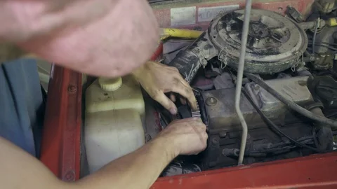 Worker changes a timing belts Stock Footage 110863848