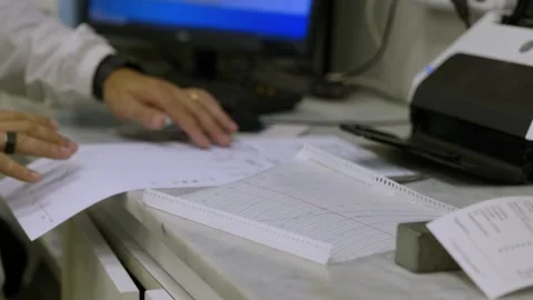 Worker Checking Graphs and Data in a Food Factory Lab Stock Footage 304035014