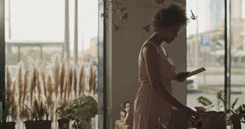 Worker checking online order goods with tablet Stock Footage 221159556