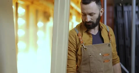 Worker checking the quality of the painted with powder coating metal products Stock Footage 147275668