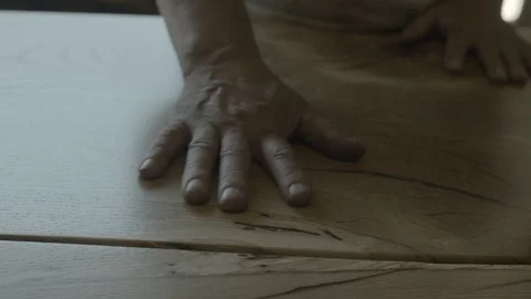 Worker checking the smoothness of wood with bare hands Stock Footage 87613532