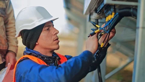Worker checking solar cell system Stock Footage 126529241