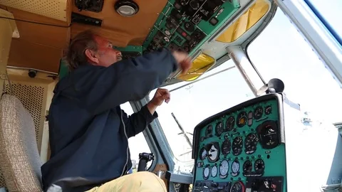 The worker checks the control panel of the aircraft. Stock Footage 81530846