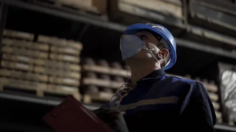 Worker checks items on shelves Stock Footage 146637099