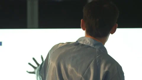 Worker checks lcd matrix of tv in laboratory Stock Footage 162364414