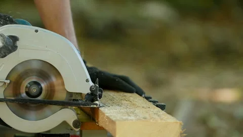 Worker with a circular saw Stock Footage 114649874