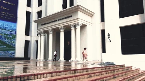 A worker clean the floor in Assumption University of Thailand Vídeo Stock 98305582