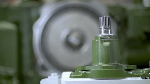 Worker cleaning big steel machine with gears. Stock Footage 111776751
