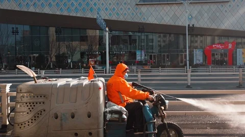 A worker cleaning with pressure machine Stock Footage 123987275