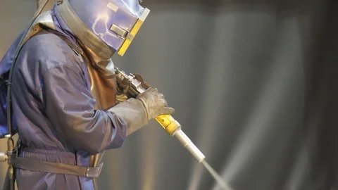 The worker cleans the elements by sanding Stock Footage 86250493