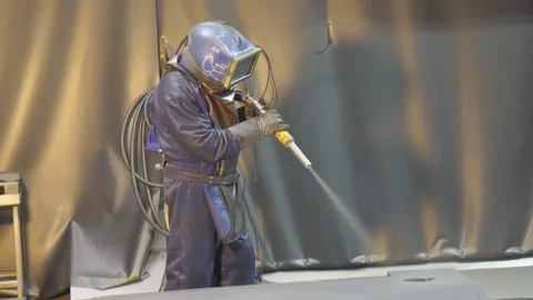 The worker cleans the elements by sanding Stock Footage 86250503