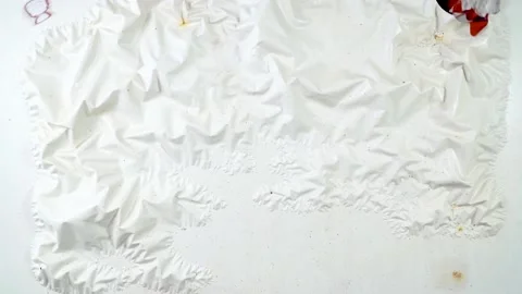 Worker cleans with spatula detached paint from metal Stock Footage 133737855