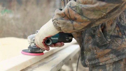 Worker cleans the surface of the board Stock Footage 97858839