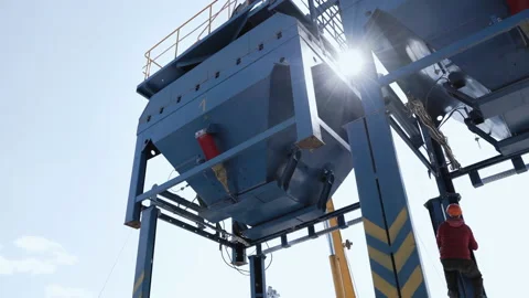 Worker climbs on metal structure at plant Stock Footage 152462728