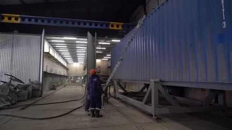  Worker climbs on a sea container. Stock Footage 105228410
