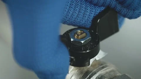 The worker closes the gas supply through the pipeline. close-up. Stock Footage 222777208