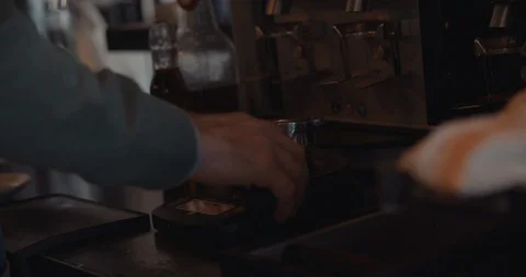 Worker At Coffee Brewery Presses Beans For Esspresso 스톡 동영상 105363072