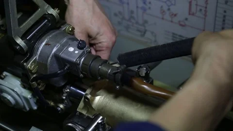The worker collects the engine of the aircraft. Shooting close-ups Stock Footage 82799809