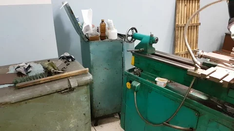 A worker at a company works behind a machine Stock-Footage 111242052