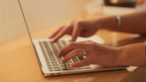 Worker composing emails at desk. Freelancer working on emails late at hotel desk Stock Footage 331463063