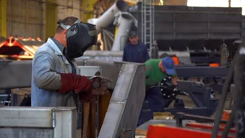 Worker conducts welding work Stock Footage 118269193