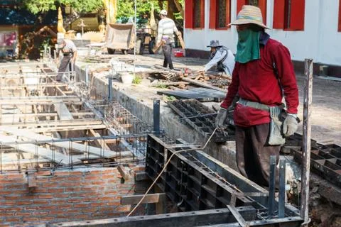 The worker is constructing underground floor of the building Stock Photos