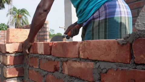 Worker Constructing Wall Stock Footage 335217529