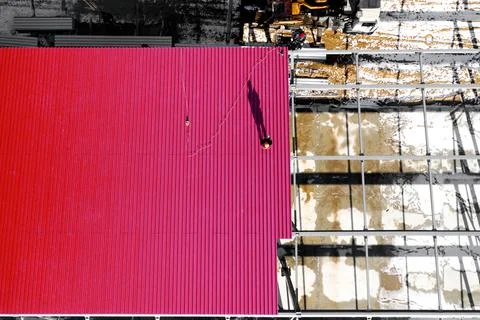 Worker for construction, installing metal roofing tools, sheet metal New elec Stock Photos