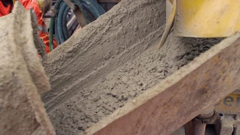 Worker at construction site are pouring concrete in mold from mixer truck Stock Footage 81537682