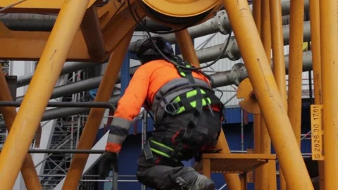 Worker at the construction site of the coal-fired power station Stock Footage 137569360