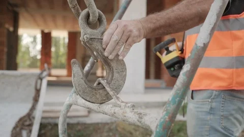 Worker In Construction Site Using Crane And Heavy Equipment Stock Footage 98334385